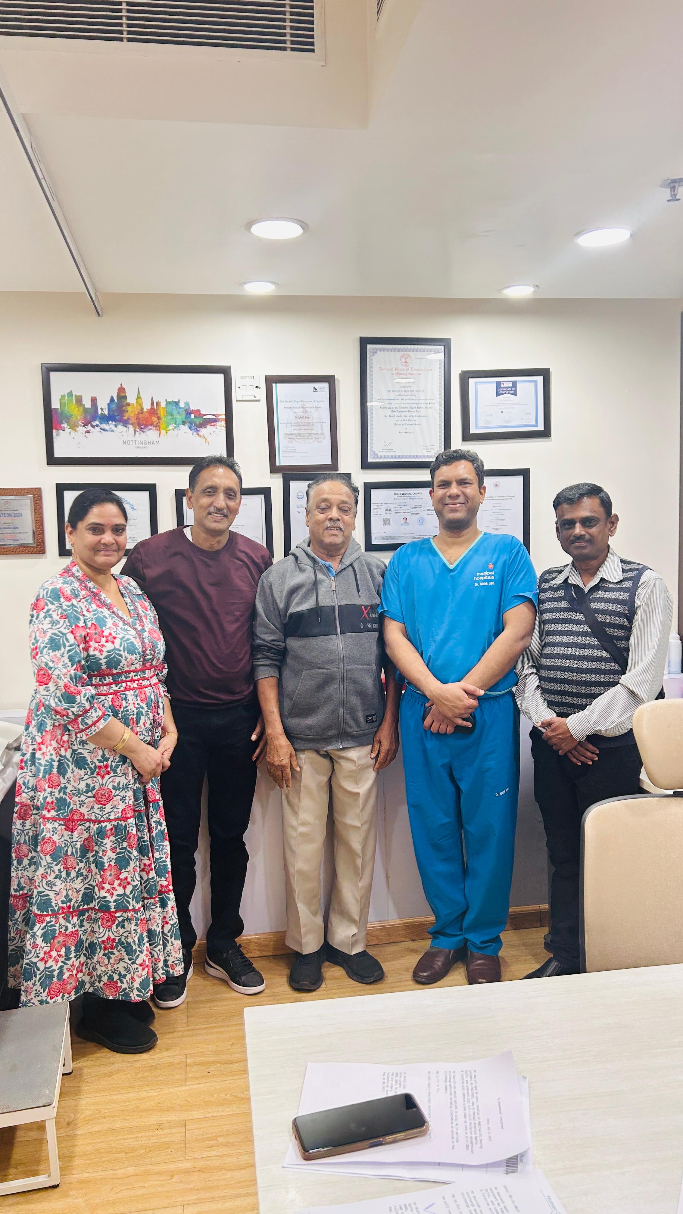Fiji Patient and Attendant with Spine Surgeon After Successful Surgery
